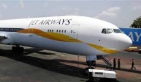 A newly acquired Jet Airways Boeing 777-300ER aircraft sits on the tarmac at Mumbai airport