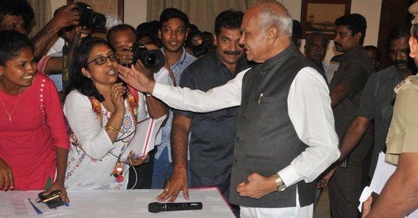 Tamil Nadu Governor Banwarilal Purohit pats woman journalist on cheek