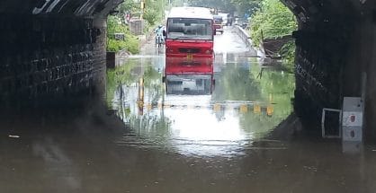 Star Bus gets stuck in waterlogged Narendra Nagar Bridge