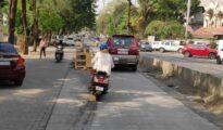 Half-completed cement road in Ramdaspeth turns accident-prone spot