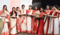 Women bid Maa farewell with Sindur khela ceremony at Katol Road.