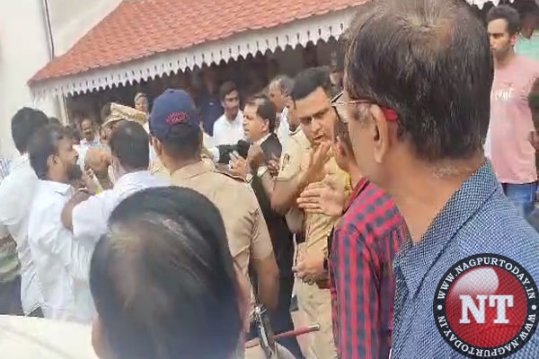 Video:  BJP leader, workers manhandle DCP Madne outside Dy CM’s bungalow in Nagpur