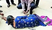 High drama as woman tries to set self ablaze at NMC office