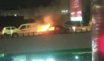 Cab bursts into flames on Shahid Gowari flyover