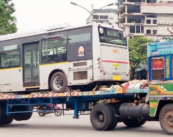 Curious: E-bus arrives in Nagpur riding atop trailer truck to join Aapli Bus fleet